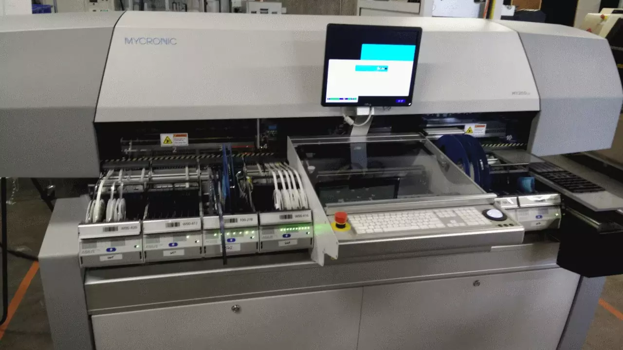 Figure 2: MacroFabs’ My200 Pick and Place. Is this a robot or just a automation machine?