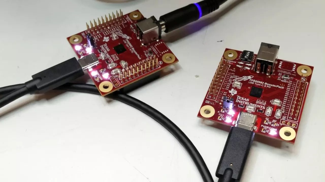 Figure 2: Two TPS65982-EVM booster packs. One is powering the other over USB Type-C. Parker was able to pull 20V @ 3.2A before his Re:load Pro overheated.