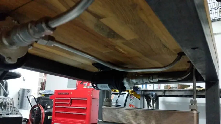 Under the brewery table are where the pumps and plate chiller are mounted.